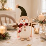 Snowman figurine wearing a knitted hat—a charming holiday decoration