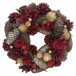 22-inch Norfolk Pine Wreath, featuring bells and ribbons for festive door decoration